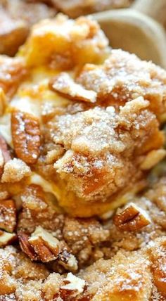 a close up view of some food in a bowl with powdered sugar on top