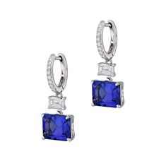 Gorgeous Tanzanite and 18Kt. White Gold Diamond Drop Earrings. Intricately designed, each earring features an impressive emerald cut Tanzanite, thoughtfully mounted East/West, and an Emerald cut diamond creating a brilliant display of light and color. A breathtaking pave of Diamonds gracefully adorns the bail for a timeless and elegant look. Tanzanite White Gold Diamond Drop Earrings 18kt. White gold Tanzanites: 6.07ct TW Emerald Cut Emerald cut Diamonds mounted east/west Diamonds: 0.69ct TW F/V Gold Diamond Drop Earrings, Emerald Cut Diamond, Store Hours, Diamond Drops, Emerald Cut Diamonds, Diamond Drop Earrings, East West, Selling Jewelry, Emerald Cut