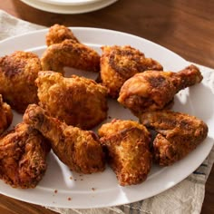 fried chicken wings on a white plate