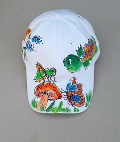 Cute Critters Baseball Cap Whimsical White Cap Hats, Playful White Baseball Cap For Spring, Whimsical White Adjustable Hat, Handmade White Trucker Hat, Handmade White Baseball Cap, Casual Hand Painted Cap, Casual Hand Painted White Hat, Artistic Adjustable Snapback Baseball Cap, Casual White Hand Painted Hats