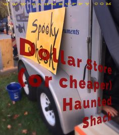 a sign on the side of a truck that says spooky drop - off