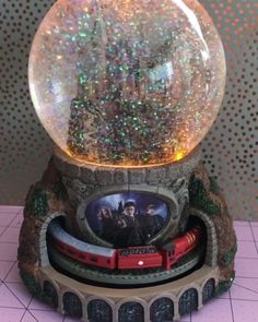 a snow globe sitting on top of a table