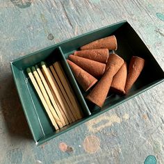 an open box filled with different types of matchsticks