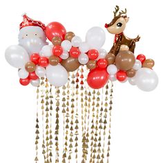 a bunch of balloons that are in the shape of santa claus and reindeer with decorations on them