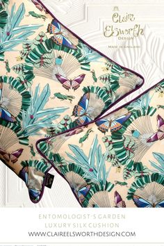 two pillows with butterflies and leaves on them