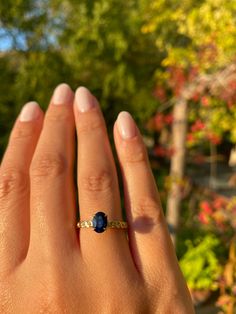 "Oval Cut 7x5 Sapphire Ring, Blue Sapphire Solitaire Ring, Chain Shaped Band, September Birthstone Ring, Gemstone Ring, Anniversary Gift for her Product Details ✿Made to Order ✿Gold Color : Available in Yellow Gold, White Gold, Rose Gold ✿Gold Kt : 14K ( also available in 18k) ✿Gemstone : Blue Sapphire ✿Size of Sapphire : 7 x 5 ✿Sapphire Ct : 1 ct ✿Setting Type : Prong Setting ✿Band Width: 2.40 mm ✿Band Height: 1.40 mm ---- PRODUCTION TIME ---- This ring will be made for you and ready to be ship 14k Gold Sapphire Jewelry With Prong Setting, Emerald Cut Sapphire Solitaire Jewelry, Sapphire Emerald Cut Ring With Bezel Setting, Sapphire Center Stone Ring, Oval Yellow Gold Promise Jewelry, Classic Yellow Gold Jewelry With Lab-created Sapphire, Yellow Gold Rings With Lab-created Sapphire Center Stone, Classic Yellow Gold Lab-created Sapphire Jewelry, Luxury Oval Lab-created Sapphire Jewelry