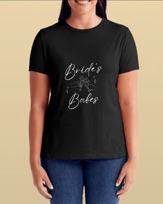 Flattering T-shirts for the Bride's crew: bridesmaids, family, friends...Great for bachelorette party, bridal shower, Jack & Jill, wedding day prep, etc. Available in black, blue, royal blue, gray, navy, charcoal, and white. Sizes S-XXL. 20% off orders of 7 or more shirts. Fitted Black T-shirt For Bachelorette Party, Black Crew Neck T-shirt For Bachelorette Party, Black Short Sleeve T-shirt For Bachelorette Party, Wedding Day Prep, Babe T Shirt, Brides Babes, Jack And Jill, Love T Shirt, Bridesmaids Gifts