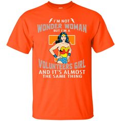 an orange t - shirt that says i'm not wonder woman but a volunteer girl and it's almost the same thing