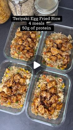 four glass containers filled with food on top of a black counter next to some rice