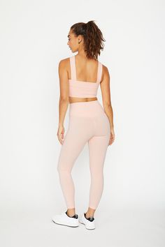 Product Details A classic low-key workout and everyday cropped legging, crafted in the ultra-soft performance fabric, high-waist with a wide waistband, hidden card pocket, tonal logo on hip, 7/8 length with 25” inseam. Complete the matching look with Leah bra top. Medium support for active and street. Materials & Care Composition: 75% Nylon, 25% Spandex. Machine wash cold with like colors, do not bleach, wash inside out. Hang or lay flat to dry, do not tumble dry. Do not dry clean. Model is wear Athleisure Leggings With Contoured Waistband, Medium Support, Pink 4-way Stretch Yoga Tights, Pink 4-way Stretch Tights For Yoga, Athleisure Leggings With Contoured Waistband For Loungewear, Pink 4-way Stretch Leggings For Yoga, Yoga Leggings With Contoured Waistband And Medium Support, Compressive Pink Yoga Pants, Pink Functional 4-way Stretch Leggings, Functional Pink Leggings For Pilates