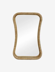 a mirror that is made out of wood and has an oval frame in the shape of a