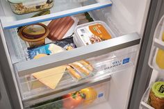 an open refrigerator filled with lots of food