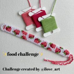 two beaded christmas ornaments with the words food challenge on them and an ornament