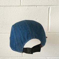 "Handmade cap with pencil holder✏️ ✎DETAILS: 5 panel cap is handmade from 10 oz indigo denim ( made in USA). Sewn with golden heavy duty top stitch thread. Patch, brim and hardware made in the USA. The brim is not a bought plastic insert. Brims are handmade here in house, they are shorter and softer than typical hats. They are super comfortable yet still completely hand washable and incredible durable. Hand built by two human makers ( apes/April & bird/Rich) with love, care and pride here in Adjustable Blue Flat Cap, Blue Adjustable Flat Cap, Adjustable Blue Denim Trucker Hat, Adjustable Denim Snapback Trucker Hat, Adjustable Denim Baseball Cap With Flat Bill, Adjustable Denim Trucker Hat Snapback, Adjustable Denim Blue Cap, Casual Everyday Cap, Casual Adjustable Hats