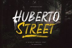 the text huberto street is written in yellow and black ink on a dark background