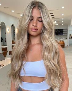 First Session Going Blonde, Long Blonde Waves, Olive Skin And Blonde Hair, Blonde Sandy Hair, Dark Blonde Hair Color Ideas For Fair Skin Hazel Eyes, Olive Skin With Blonde Hair, Malibu Blonde Hair Color, Dark Blonde Hair Dark Roots, Long Sandy Blonde Hair