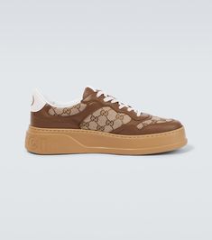 GG leather-trimmed canvas sneakers Brown Canvas High-top Sneakers With Vulcanized Sole, Sporty Brown Canvas High-top Sneakers, Sporty Brown High-top Canvas Sneakers, Designer Beige Sneakers With Rubber Sole, Brown Canvas High-top Sneakers With Rubber Sole, Brown Canvas Sneakers With Gum Sole, Designer Beige Sneakers With Contrast Sole, Brown Canvas Sneakers With Vulcanized Sole, Gucci Beige Low-top Sneakers