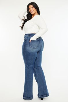 Our Connie High Rise Wide Flare jeans are the perfect pair of trendy flare jeans with a wider flare for that ultimate retro vibe. Comes in soft buttery stretch denim that melts to your every curve up to the knees where it flares out wider as it goes to the hems. Features medium fading, whiskering, a single-button closure and a zip fly. 12.5" Rise / 32" Inseam (In Size 16W) 75% Cotton, 23% Tencel, 2% Spandex Dark Wash Style #: KC20024D-P Stretchiness Level >> Stretch SIZE WAIST HIP 16W 25.5" 33.5 Trendy Flare Jeans, Petite Curvy, Fitted Joggers, Outwear Jackets, Romper Pants, Retro Vibe, Dress Romper, Flare Jeans, Boyfriend Jeans