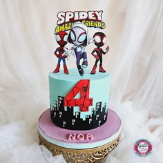 a spiderman themed birthday cake with the number four on it's top tier