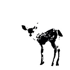 a black and white image of a deer with spots on it's back legs