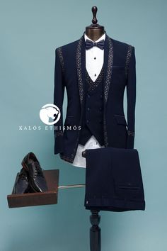 Introducing the KALÓS ETHISMÓS bespoke embroidered suit, a masterpiece crafted for those who desire personalized elegance. This stunning dark midnight blue suit, made from the finest Italian fabric, features a sharp slim-fit design and full sleeves, making it the perfect blend of sophistication and modernity. The peak lapel collar adds a bold, refined touch, while the intricate cutdana and bead work elevates the overall aesthetic with a luxurious, handcrafted feel. Complemented by dark midnight Classy Plus Size, Midnight Blue Suit, Blue Combination, Western Suits, Embroidered Suit, Blue Bow Tie, Classic Trousers, Groom Wear, Peak Lapel