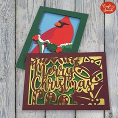 a christmas card with a cardinal on it and the words merry christmas pop up in gold foil