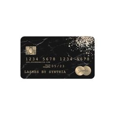 a black and gold credit card