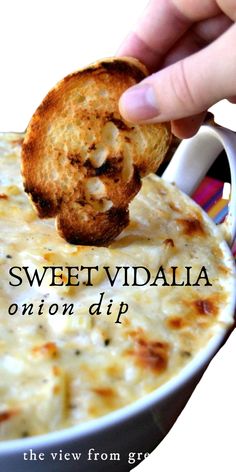 a hand dipping some bread into a bowl of food with the words sweet vidalia on it