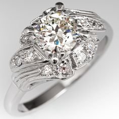 a white gold ring with diamonds on it