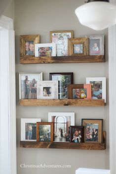 the shelves are filled with family photos and pictures