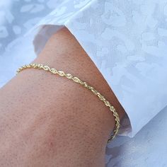 Beautiful solid 14k Yellow gold rope bracelet. Perfect for everyday and every occasion. Elegant, shiny and everlasting. 14k gold will never tarnish or rust.  Materials: Solid 14k Yellow Gold Lenght: 7 Inches Width: 2mm Weight: 2.1 grams (Average weight) 14k stamped Brand new Our Mission/Return Policy Briza Collections is a small family owned business that works hard on providing the best selection of Fine Solid Gold Jewelry for the best prices.  Our Goal is to bring you happiness and satisfactio Gold Rope Bracelet, Bracelet For Kids, Average Weight, Solid Gold Jewelry, Small Family, Have A Great Day, Delicate Bracelet, Link Bracelets, Chain Link