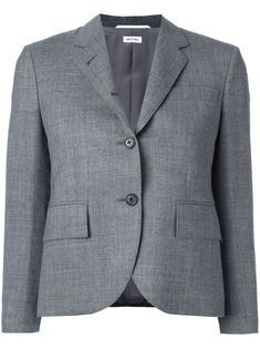 Grey wool Classic Single Breasted Sport Coat In Medium Grey 2-Ply Wool Fresco from Thom Browne featuring notched lapels, cropped sleeves, faux button cuffs, a button fastening, a chest pocket and flap pockets. | Thom Browne Classic Single Breasted Sport Coat In Medium Grey 2-Ply Wool Fresco Short Blazer, Gray Blazer, Grey Jacket, Grey Blazer, Blazer And Shorts, Sports Blazer, Leather Mini Skirts, Leather Blazer, Short Jacket