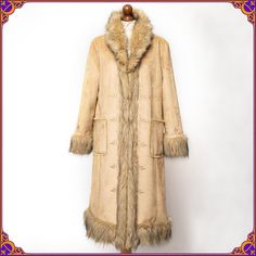 Wear a vintage work of art! Absolutely stunning shaggy faux fur Penny Lane vegan coat. It features a gorgeous floral embroidery &  100% genuine vegan faux fur trim. Size medium/large  ⫸ Beautiful pre-loved vintage condition!  No major flaws. Without any holes, odors. Everything is shown      on the photos. Please see the pictures.  ⫸ 1960s afghan coat style! ⫸ Fabric: shell- polyester/acrylic // 100% genuine vegan faux fur ⫸ Ultra soft and cozy ⫸ ✿ 100% VEGAN ✿ ⫸ Beautiful embroidered details ⫸ Bohemian Long Sleeve Fur Coat For Fall, Bohemian Outerwear With Faux Fur Lining And Long Sleeves, Bohemian Outerwear With Faux Fur Lining, Bohemian Long Sleeve Fur Coat With Faux Fur Lining, Bohemian Long Fur Coat With Faux Fur Trim, Long Hippie Winter Outerwear, Bohemian Faux Fur Coat For Winter, Bohemian Brown Fur Coat With Faux Fur Lining, Bohemian Long Coat With Faux Fur Trim