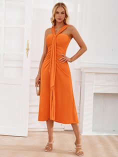 Add a pop of bright orange to your wardrobe with our Rylee Solid Halter Neck Maxi Dress! Featuring a halter neck design, this dress is perfect for any summer occasion. Stay stylish and comfortable all day with this must-have maxi dress. Size Guide: Model is 5’65” tall, and has a 33.6” bust, 24.1” waist, & 35.2” hips. She is wearing a S / US 4 / AU 8. This dress is true to size. Material: 100% Jersey. Feature: Halter neckline. Sleeveless. Maxi length. Open Back. Stretch Fabrication. Relax fit. Care Instructions: Machine wash / Cold hand wash Midi Dress Elegant, Halter Neck Maxi Dress, Gathered Dress, Split Dress, Pleated Midi Dress, Pink Midi Dress, Crop Top Blouse, Lace Maxi Dress, Middle Age