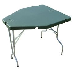 a green folding table on white background