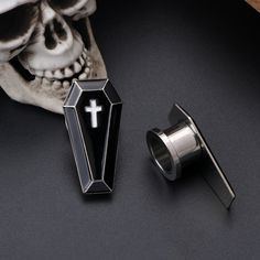 One package includes one pair ear gauge. Gauges: 0g(8mm), 00g(10mm), 7/16''(11mm), 1/2''(12.7mm). Please Choose the Correct Size. Material: 316L Surgical Stainless Steel. Light and comfortable. The trendy coffin design can show your own personality. This ear tunnels is an ideal gift choice on Halloween Day as Halloween Jewelry, Christmas Day, Anniversary Day, Valentine's Day and Birthday to your special one. Let your personality shine through your accessories. You can check out our other listing Black Piercings For Halloween Gift, Gothic Piercings For Halloween Gift, Gothic Plug Earrings For Halloween Gift, Gothic Halloween Plug Earrings As A Gift, Emo Pierced Jewelry For Halloween, Gothic Plug Earrings For Halloween, Gothic Halloween Plug Earrings, Black Earrings For Halloween Cosplay, Black Halloween Cosplay Earrings