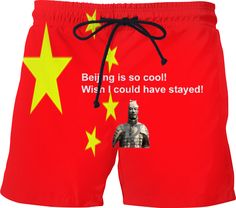 a red shorts with yellow stars on it and a photo of a man in armor