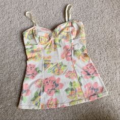 Aritzia Talula Floral Tank Cream Colored With Pink And Green Flowers Adjustable Slider Straps *Nwot, Never Worn Size Xs - Very Stretchy And Form Fitting Approx Flat Measurements: Bust: 12” Waist: 11” Length From Top Of Bust To Hem: 15” Cover Photo Is For Style Reference, Same Tank But Different Color. Item For Sale Is Cream Colored. Great For Nights Out! Pink And Green Flowers, Style Reference, Floral Tank, Cover Photo, Green Flowers, Cream White, Project Ideas, Cover Photos, Cream Color