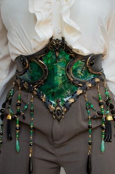 Black emerald waspie, made to size Introducing the highly sought-after, made-to-size, fully handmade waspie that captures the delicate beauty of emerald crystal. This corset is adorned with high-quality rhinestones, glass, and crystal beading. While the beading and emerald color (since it's all custom hand tinted) may vary from the example image, this individualized touch ensures that each piece remains one-of-a-kind. Sturdy and Graceful: No Risk of Breakage! These corsets feature a sturdy base Dion Lesage, Baroque Corset, Joyce Spakman, Emerald Aesthetic, Crystal Corset, Vampire Vibes, Candy Makeup, Fashion Romantic, Fair Outfits