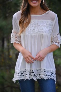 $42.00 This top is bohemia bliss! Dreamy floral crochet makes it anything but basic. It's also in a versatile cream color you can easily pair with colorful shorts! Crochet is lined in the front and not in the back. Fabric is a cotton-blend. Colorful Shorts, Feminine Clothing, Shorts Crochet, Floral Crochet, Blue Door, Summer Set, Feminine Outfit, Girly Things, Boutique Clothing