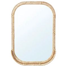 a gold framed mirror with beading on the edges and an oval frame in the middle