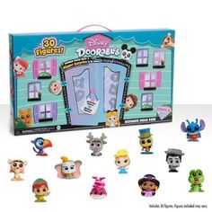 an assortment of littlest pet shop toys in a box with the contents on display