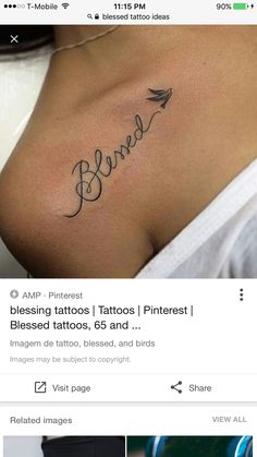 the back of a woman's stomach with tattoos on it and an image of a bird