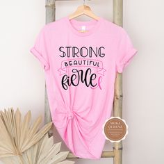 Pink Ribbon Shirt | Pink T shirt with black and pink text Inspirational Pink Cotton T-shirt, Inspirational Pink Crew Neck Top, Inspirational Pink Tops With Text Print, Pink Cotton Inspirational T-shirt, Inspirational Pink T-shirt With Text Print, Ribbon Shirt, Awareness Shirt, Fitted Silhouette, Shirt For Women