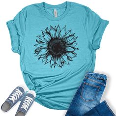 Style: Add some sunshine to your wardrobe with our stylish flower shirts for women! These graphic tees for women are the perfect blend of style and comfort and are sure to add some fun and fashion to your attire. Quality: Our nature lover tops for women are designed and printed with love in the USA. We use high-quality inks on our premium Bella Canvas unisex sunflower tshirt for a bold and stylish look. Fabric: Our womens tops are crafted with a premium blend of 100% Airlume combed and ring-spun Sunflower Graphic, Wildflower Shirt, Sunny Vibes, Shirts Short Sleeve, Flowers Gifts, Fitted Sleeves, Boho Flowers, Graphic Tank Tops, Womens Crewneck