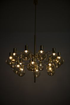 a chandelier with many lights hanging from it