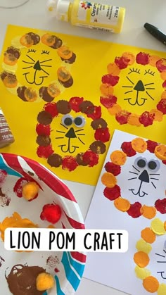 the lion pom craft is made with paper plates and construction supplies for kids to make