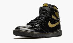 The Air Jordan 1 High OG “Black/Metallic Gold” is one of several exciting colorways from Jordan Brand’s Holiday 2020 collection.  A luxurious take on Michael Jordan’s first signature shoe in the coveted high-top silhouette, the “Black/Metallic Gold” employs premium black patent leather on the entire upper, including the perforated toe, mid-panel, and heel.  The look is reminiscent of the Jordan 1 Mid from 2003 that featured the same black leather upper with Metallic Gold accenting.  Like that re Metallic Gold Shoes, Sneakers Box, Kobe Shoes, Nike Gold, Jordan Sneakers, Air Jordan 1 Retro High Og, Air Jordan 1 Retro High, Gold Shoes, Air Jordan 1 High