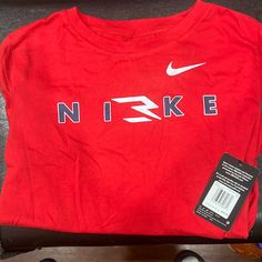 Nike Boys T-Shirt Nwt. Size Xl. For 13-15 Yrs Old. University Red Nike Red Graphic Tee, Nike Red Graphic Tee Top, Red Long Sleeve T-shirt For School Spirit, Old University, Sports Meet, Nike Boys, Nike Boy, Nike Red, Nike Tshirt