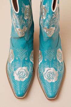 Saddle up for sweet days spent strutting in the Hadria Turquoise Embroidered Mid-Calf Western Boots! Textured faux leather shapes these adorable boots with a pointed-toe upper, a seamed vamp, and an 8"" mid-calf shaft with a 12.75"" circumference. Western-inspired, rose floral embroidery runs throughout, while pull tabs at the instep and outstep of the curved topline complete the slip-on design. Stacked wood-look block heel. 2. 5" wood-look stacked heel. Lightly cushioned insole. Rubber sole has nonskid markings. Man Made Materials. Imported. Lulus | Hadria Turquoise Embroidered Mid-Calf Western High Heel Boots | Size 6.5. Sweet Days, Wearable Blanket, Sweetest Day, Heel Boots, Comforters Cozy, High Heel Boots, Cozy Sweaters, Stacked Heel, Western Boots